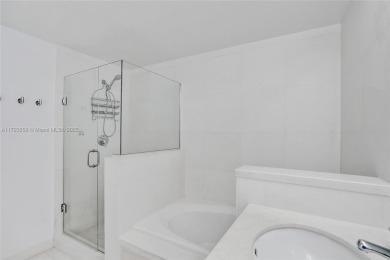 MOTIVATED SELLER!! Rare Bayfront Townhome with 30ft Boat Dock in on Normandy Shores Golf Course in Florida - for sale on GolfHomes.com, golf home, golf lot