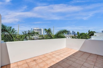 MOTIVATED SELLER!! Rare Bayfront Townhome with 30ft Boat Dock in on Normandy Shores Golf Course in Florida - for sale on GolfHomes.com, golf home, golf lot