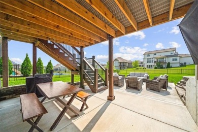 Welcome to this exceptional reverse 1.5-story walkout home in on Fred Arbanas Golf Course At Longview Lakes - Longview Lake in Missouri - for sale on GolfHomes.com, golf home, golf lot