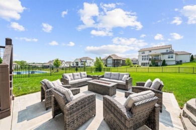 Welcome to this exceptional reverse 1.5-story walkout home in on Fred Arbanas Golf Course At Longview Lakes - Longview Lake in Missouri - for sale on GolfHomes.com, golf home, golf lot