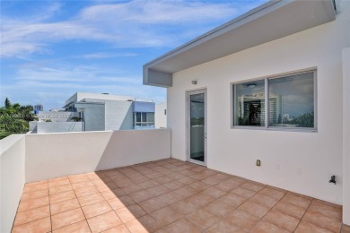 MOTIVATED SELLER!! Rare Bayfront Townhome with 30ft Boat Dock in on Normandy Shores Golf Course in Florida - for sale on GolfHomes.com, golf home, golf lot
