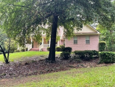 Welcome to 100 Goldfinch Circle--an all-brick ranch-style home on Turtle Cove Golf Course in Georgia - for sale on GolfHomes.com, golf home, golf lot