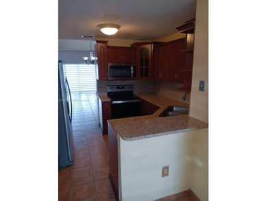 Spacious 2/2.5, tiled floors downstairs and wood upstairs, clean on Miccosukee Golf and Country Club in Florida - for sale on GolfHomes.com, golf home, golf lot