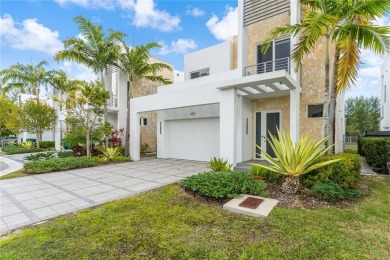 EXQUISITE TWO-STORY HOME IN THE HEART OF DORAL WITH STUNNING on Jim McLean Signature Course in Florida - for sale on GolfHomes.com, golf home, golf lot