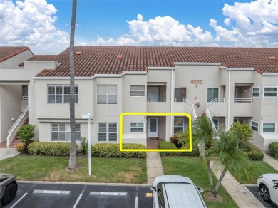 Newly painted two bedroom two full bath one level condo on the on Isla Del Sol Yacht and Country Club in Florida - for sale on GolfHomes.com, golf home, golf lot
