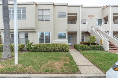 Newly painted two bedroom two full bath one level condo on the on Isla Del Sol Yacht and Country Club in Florida - for sale on GolfHomes.com, golf home, golf lot