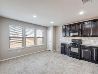 This meticulously maintained home offers 2 bedrooms plus a on Frisco Lakes Golf Course in Texas - for sale on GolfHomes.com, golf home, golf lot