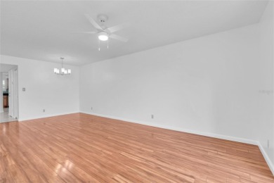 Newly painted two bedroom two full bath one level condo on the on Isla Del Sol Yacht and Country Club in Florida - for sale on GolfHomes.com, golf home, golf lot