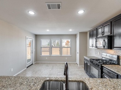 This meticulously maintained home offers 2 bedrooms plus a on Frisco Lakes Golf Course in Texas - for sale on GolfHomes.com, golf home, golf lot