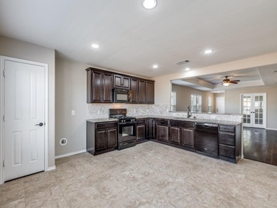 This meticulously maintained home offers 2 bedrooms plus a on Frisco Lakes Golf Course in Texas - for sale on GolfHomes.com, golf home, golf lot