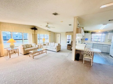 Welcome to this beautiful 2-bedroom, 2-bathroom home nestled in on Pine Lakes Country Club in Florida - for sale on GolfHomes.com, golf home, golf lot
