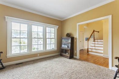 Southern Low-Country custom-built home sits in a quiet on Carolina National Golf Club in North Carolina - for sale on GolfHomes.com, golf home, golf lot