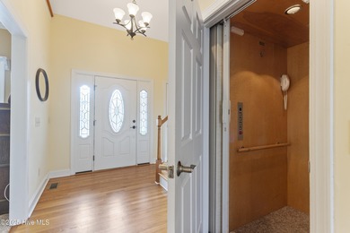 Southern Low-Country custom-built home sits in a quiet on Carolina National Golf Club in North Carolina - for sale on GolfHomes.com, golf home, golf lot