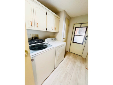 Welcome to this beautiful 2-bedroom, 2-bathroom home nestled in on Pine Lakes Country Club in Florida - for sale on GolfHomes.com, golf home, golf lot