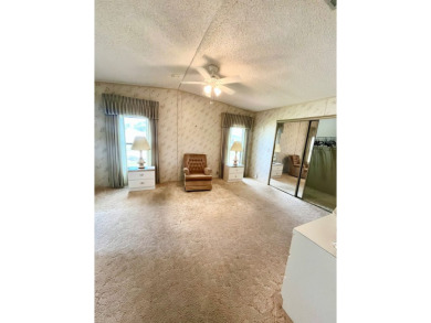 Welcome to this beautiful 2-bedroom, 2-bathroom home nestled in on Pine Lakes Country Club in Florida - for sale on GolfHomes.com, golf home, golf lot