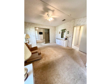 Welcome to this beautiful 2-bedroom, 2-bathroom home nestled in on Pine Lakes Country Club in Florida - for sale on GolfHomes.com, golf home, golf lot
