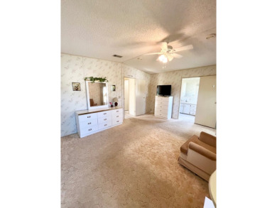 Welcome to this beautiful 2-bedroom, 2-bathroom home nestled in on Pine Lakes Country Club in Florida - for sale on GolfHomes.com, golf home, golf lot