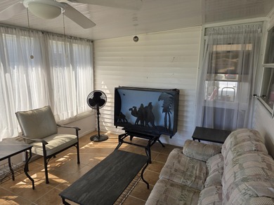 LAND OWNED 3-bedroom, 2 bath home located on a lake. Move -In on Savanna Golf Club in Florida - for sale on GolfHomes.com, golf home, golf lot
