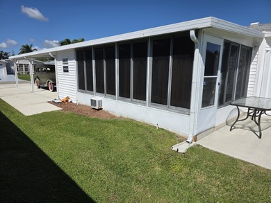 LAND OWNED 3-bedroom, 2 bath home located on a lake. Move -In on Savanna Golf Club in Florida - for sale on GolfHomes.com, golf home, golf lot
