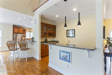 Southern Low-Country custom-built home sits in a quiet on Carolina National Golf Club in North Carolina - for sale on GolfHomes.com, golf home, golf lot