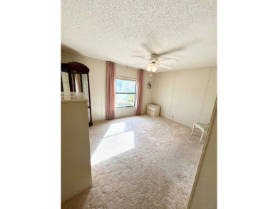 Welcome to this beautiful 2-bedroom, 2-bathroom home nestled in on Pine Lakes Country Club in Florida - for sale on GolfHomes.com, golf home, golf lot