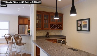 Southern Low-Country custom-built home sits in a quiet on Carolina National Golf Club in North Carolina - for sale on GolfHomes.com, golf home, golf lot