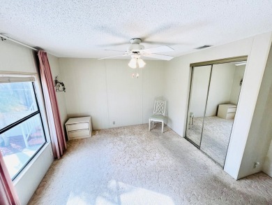 Welcome to this beautiful 2-bedroom, 2-bathroom home nestled in on Pine Lakes Country Club in Florida - for sale on GolfHomes.com, golf home, golf lot