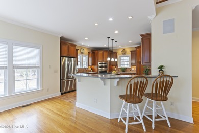 Southern Low-Country custom-built home sits in a quiet on Carolina National Golf Club in North Carolina - for sale on GolfHomes.com, golf home, golf lot