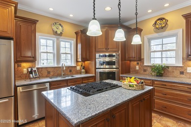 Southern Low-Country custom-built home sits in a quiet on Carolina National Golf Club in North Carolina - for sale on GolfHomes.com, golf home, golf lot