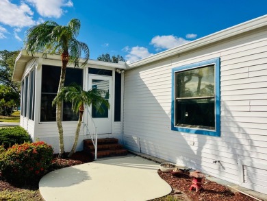 Welcome to this beautiful 2-bedroom, 2-bathroom home nestled in on Pine Lakes Country Club in Florida - for sale on GolfHomes.com, golf home, golf lot