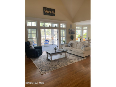 Southern Low-Country custom-built home sits in a quiet on Carolina National Golf Club in North Carolina - for sale on GolfHomes.com, golf home, golf lot