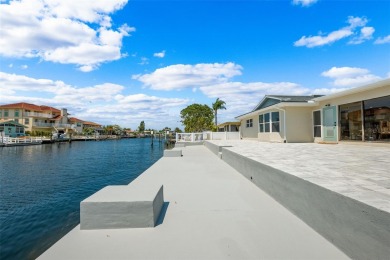 Welcome to your waterfront dream home in Gulf Harbors of New on Gulf Harbors Golf Course in Florida - for sale on GolfHomes.com, golf home, golf lot