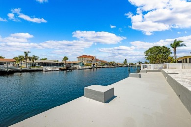 Welcome to your waterfront dream home in Gulf Harbors of New on Gulf Harbors Golf Course in Florida - for sale on GolfHomes.com, golf home, golf lot