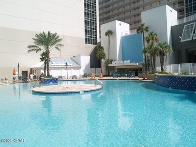 Step inside this beautifully maintained Laketown Wharf condo on Signal Hill Golf Course, Inc. in Florida - for sale on GolfHomes.com, golf home, golf lot