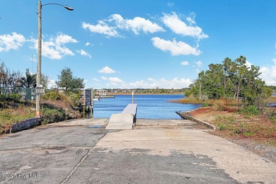 Looking for a home in the quiet area of Oak Island, but still on Founders Club At St. James Plantation in North Carolina - for sale on GolfHomes.com, golf home, golf lot