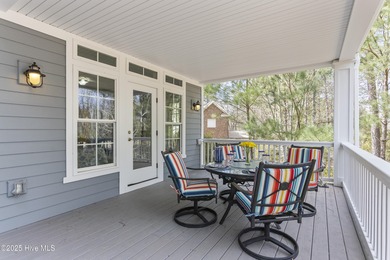 Southern Low-Country custom-built home sits in a quiet on Carolina National Golf Club in North Carolina - for sale on GolfHomes.com, golf home, golf lot