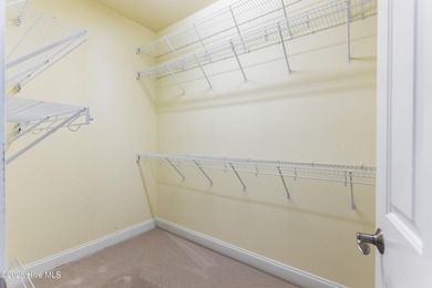 Southern Low-Country custom-built home sits in a quiet on Carolina National Golf Club in North Carolina - for sale on GolfHomes.com, golf home, golf lot