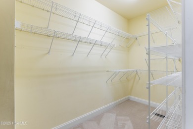 Southern Low-Country custom-built home sits in a quiet on Carolina National Golf Club in North Carolina - for sale on GolfHomes.com, golf home, golf lot