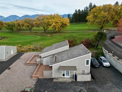 Check out this perfectly located 2 bedroom/2 bathroom unit, with on Polson Bay Golf Course - Championship Course in Montana - for sale on GolfHomes.com, golf home, golf lot