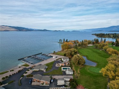 Check out this perfectly located 2 bedroom/2 bathroom unit, with on Polson Bay Golf Course - Championship Course in Montana - for sale on GolfHomes.com, golf home, golf lot