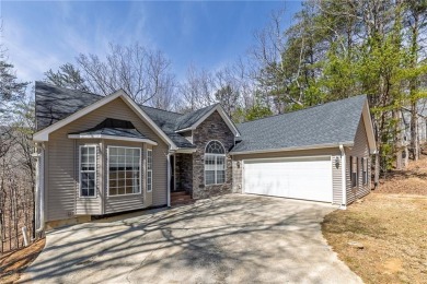Welcome home to your own private mountainside retreat in Lake on The Highlands Course at Lake Arrowhead in Georgia - for sale on GolfHomes.com, golf home, golf lot