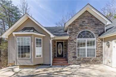 Welcome home to your own private mountainside retreat in Lake on The Highlands Course at Lake Arrowhead in Georgia - for sale on GolfHomes.com, golf home, golf lot