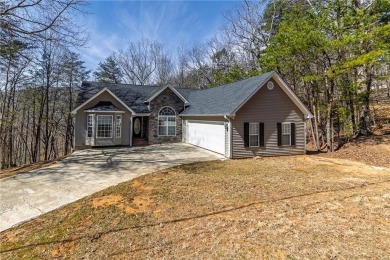 Welcome home to your own private mountainside retreat in Lake on The Highlands Course at Lake Arrowhead in Georgia - for sale on GolfHomes.com, golf home, golf lot