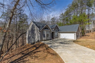 Welcome home to your own private mountainside retreat in Lake on The Highlands Course at Lake Arrowhead in Georgia - for sale on GolfHomes.com, golf home, golf lot