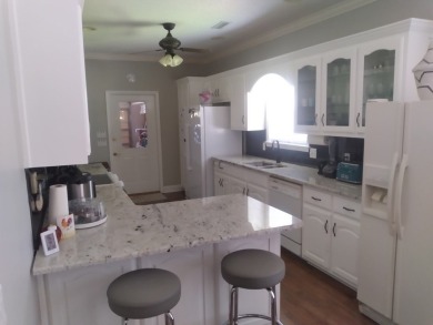 This stunning property at Dothan National Golf Club/Villas at on Dothan National Golf Club and Hotel in Alabama - for sale on GolfHomes.com, golf home, golf lot