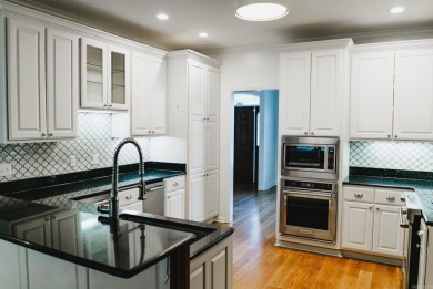 This inviting two-story home offers four bedrooms and on Monticello Country Club in Arkansas - for sale on GolfHomes.com, golf home, golf lot