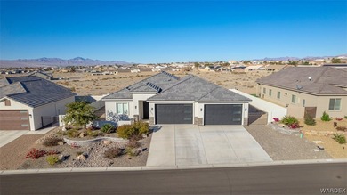 This contemporary home is located in the beautiful and gated Los on Los Lagos Golf Club in Arizona - for sale on GolfHomes.com, golf home, golf lot