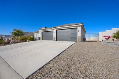 This contemporary home is located in the beautiful and gated Los on Los Lagos Golf Club in Arizona - for sale on GolfHomes.com, golf home, golf lot