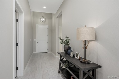 This contemporary home is located in the beautiful and gated Los on Los Lagos Golf Club in Arizona - for sale on GolfHomes.com, golf home, golf lot