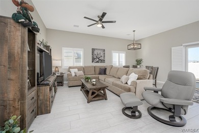 This contemporary home is located in the beautiful and gated Los on Los Lagos Golf Club in Arizona - for sale on GolfHomes.com, golf home, golf lot